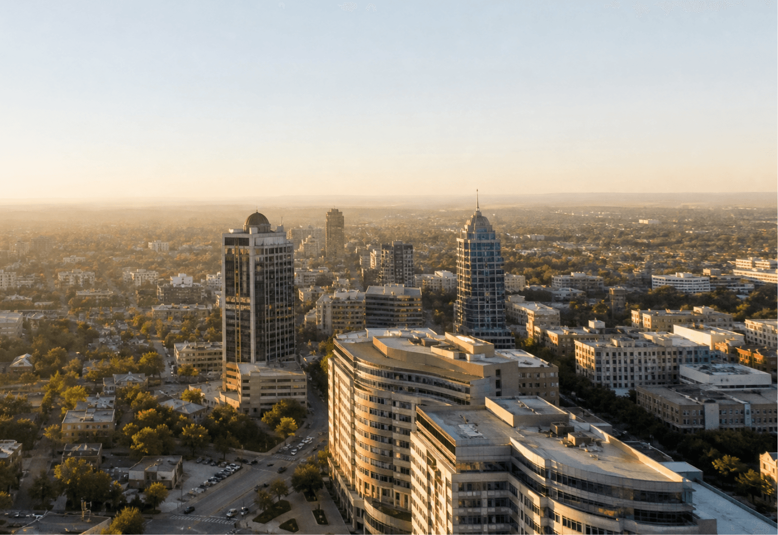 Aerial view of a city skyline at golden hour